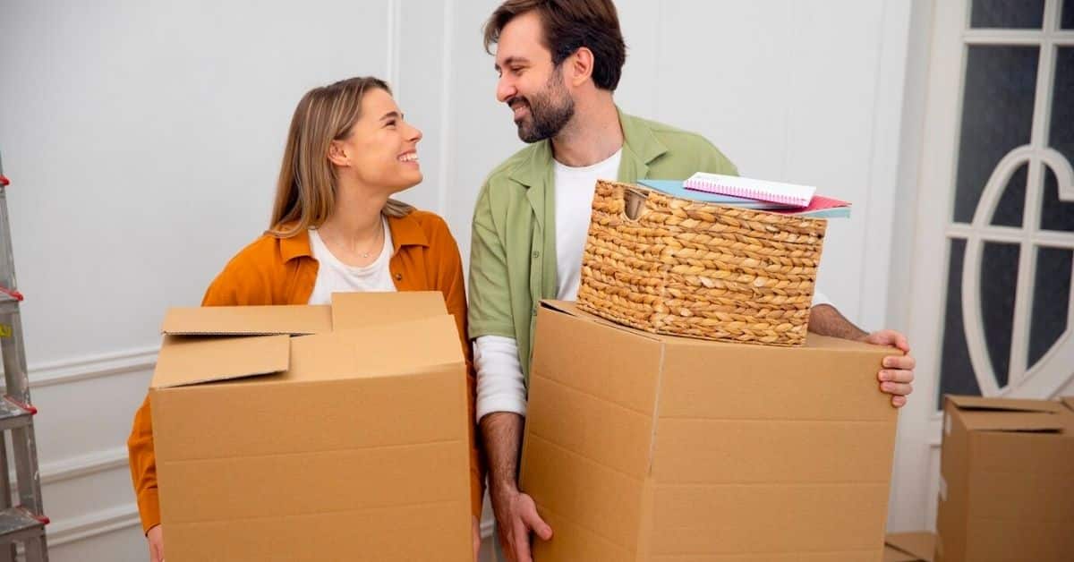 Young couple moving in new home