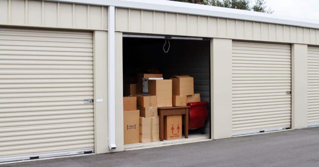 Self storage warehouse with single storage unit open